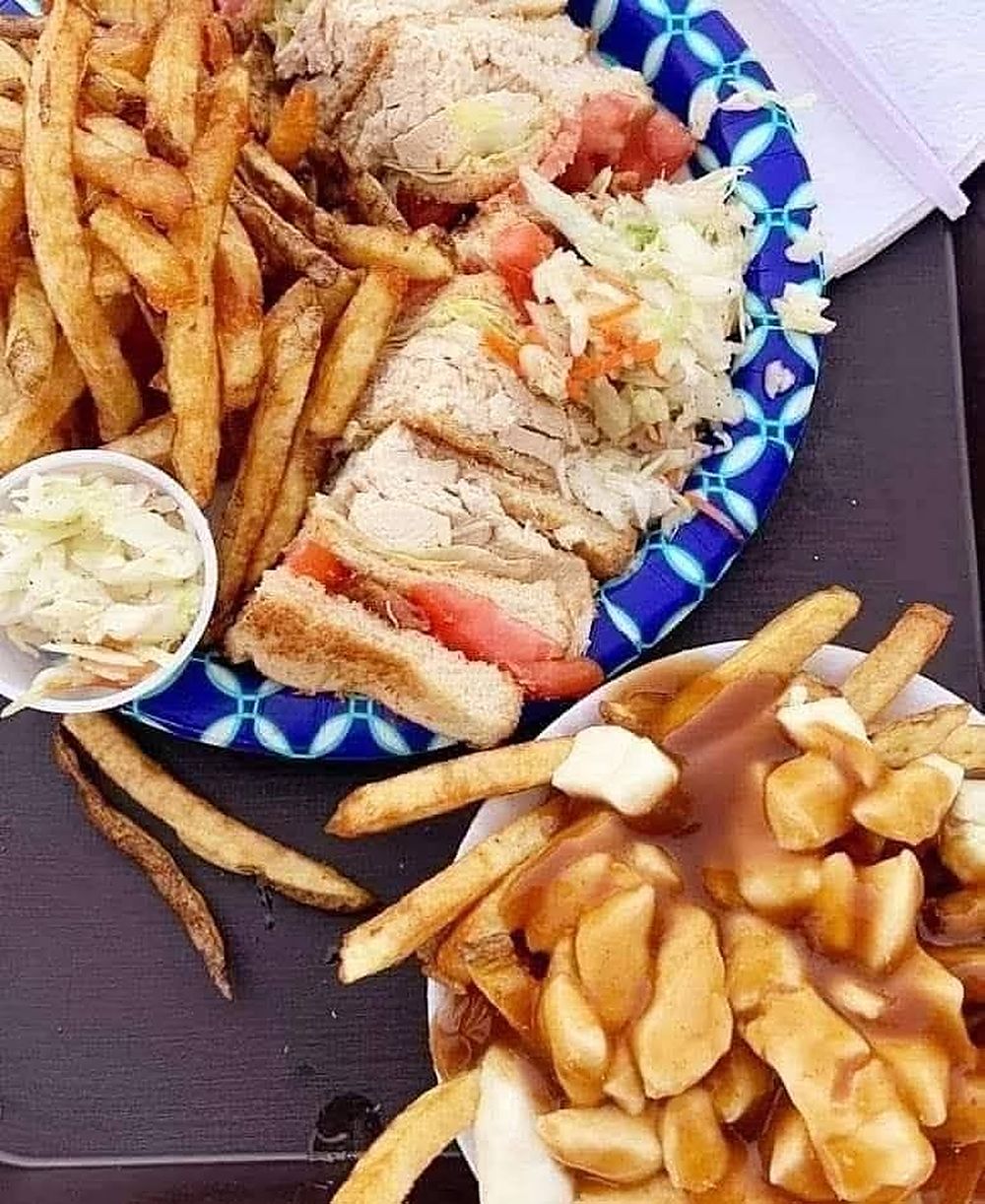 Mammy's club sandwich platter with fresh-cut fries and poutine