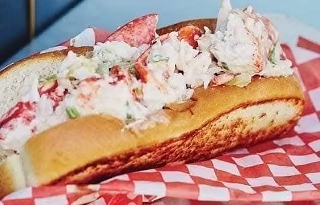 Mammy's lobster roll piled high on a toasted bun