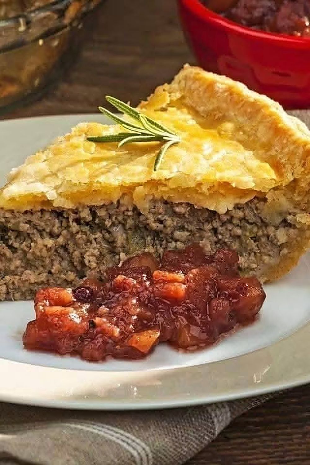 A slice of Mammy's meat pie with cranberry chutney